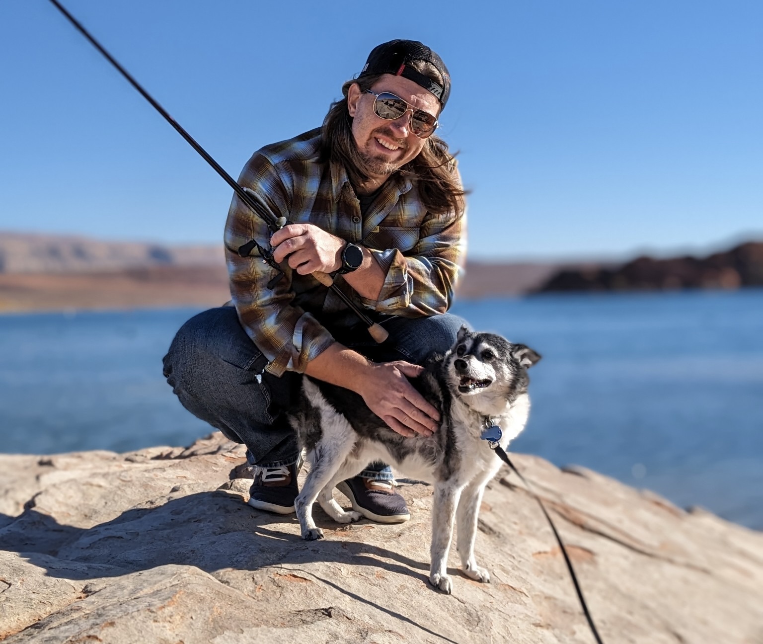 Sean Szurko, the creator of Compounding Edges with his dog.